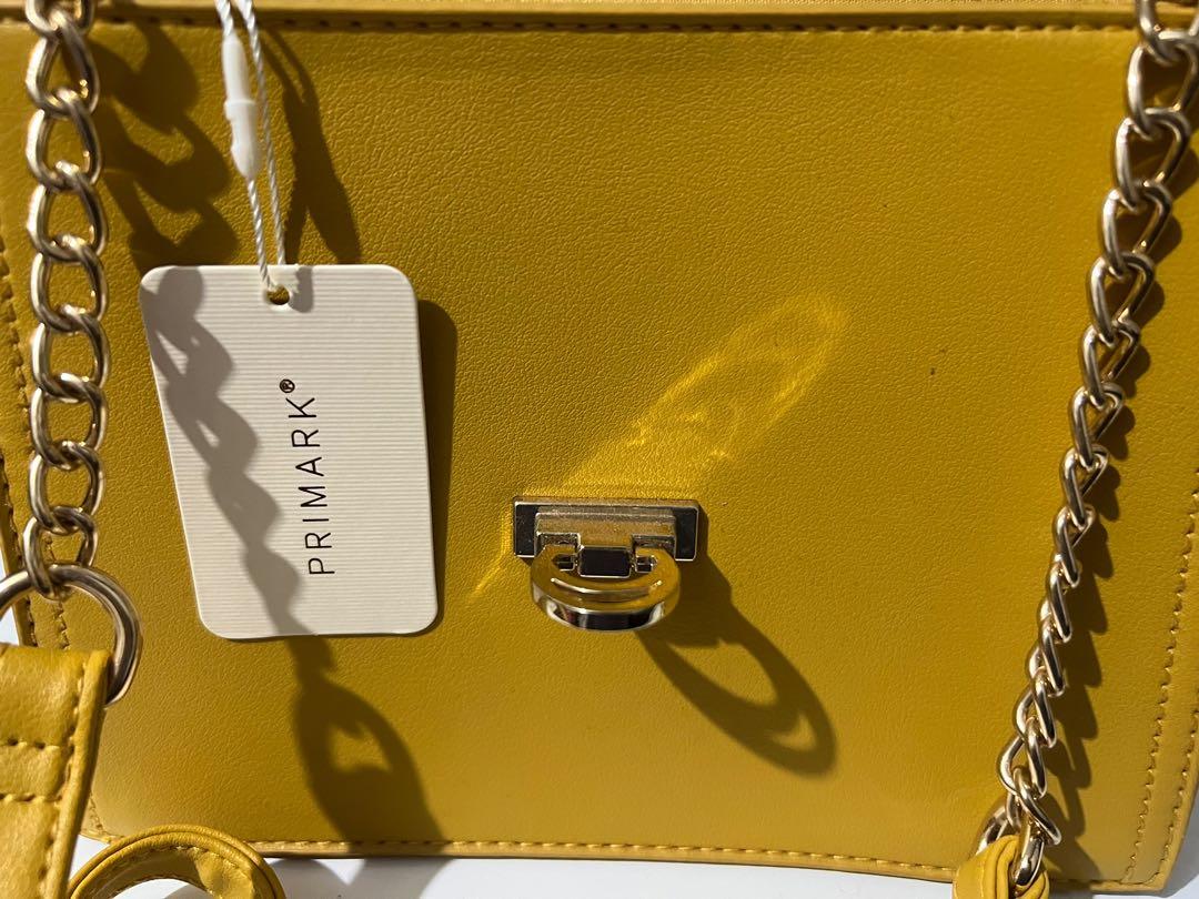 Yellow handbags primark store