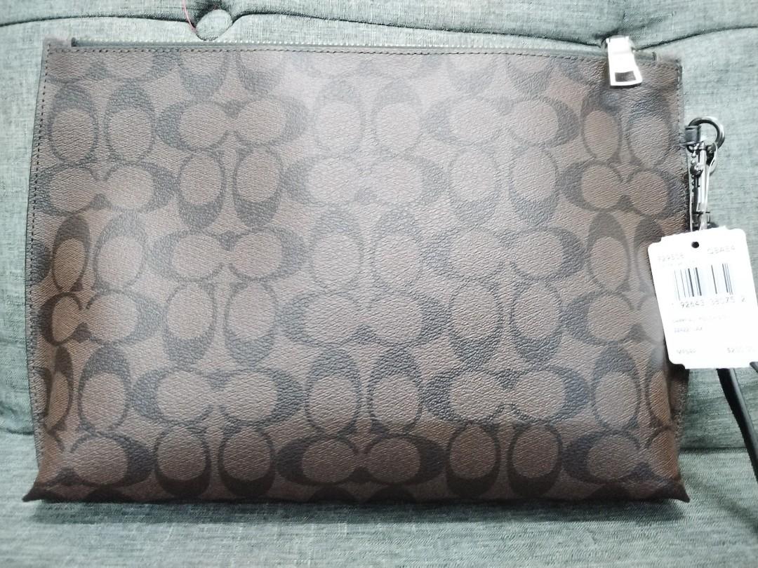 Coach clutch sales bag price