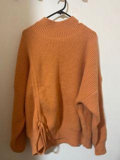 Sage + Paige orange sweater