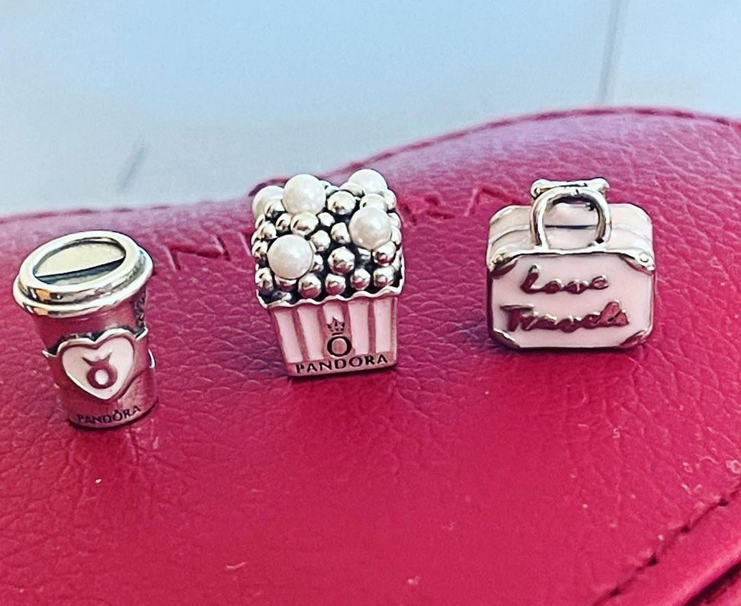 Pandora pink 2025 travel bag charm