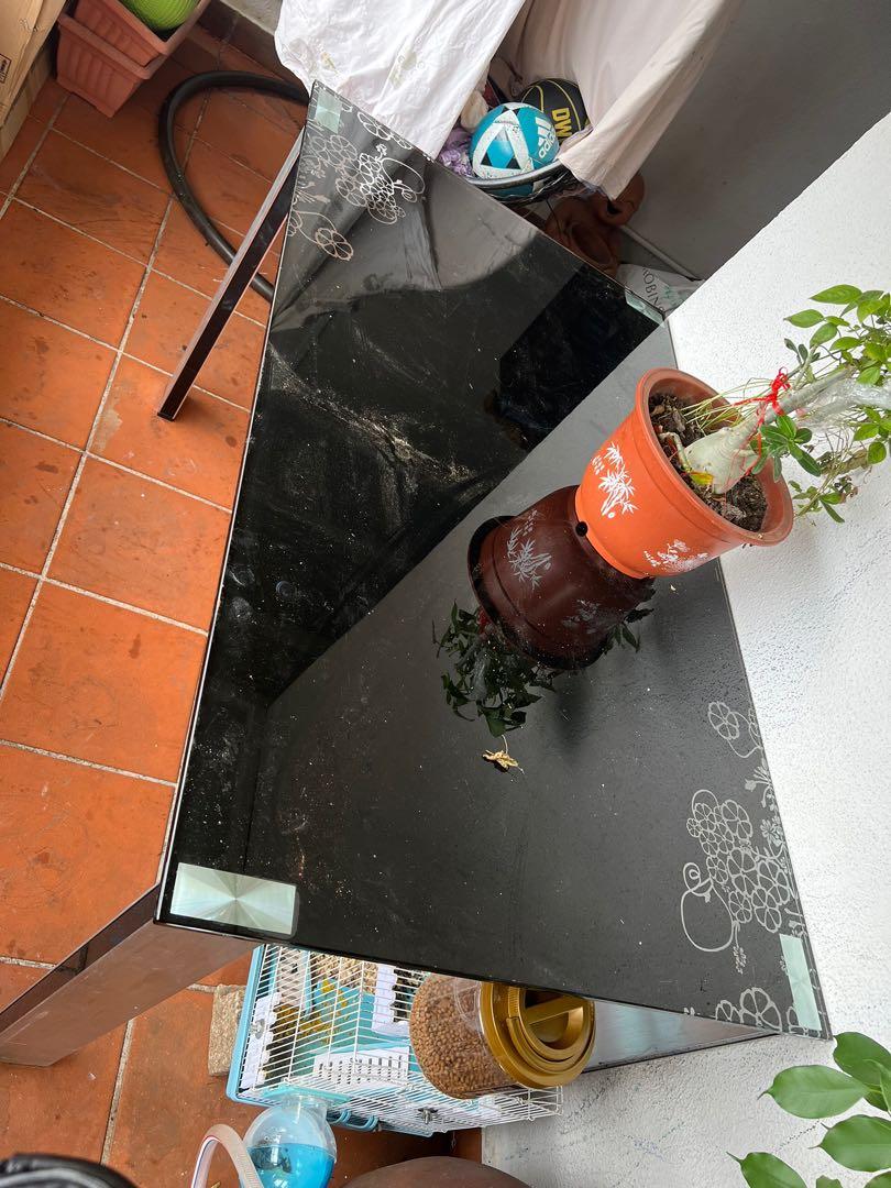 Dining Table (Category: Other Home Furniture) located in Singapore. Submitted by jagdishchandrabose (Listing ID 1159952705, Image 2). Description: 135cm X 80cm Black Printed Glass Top .