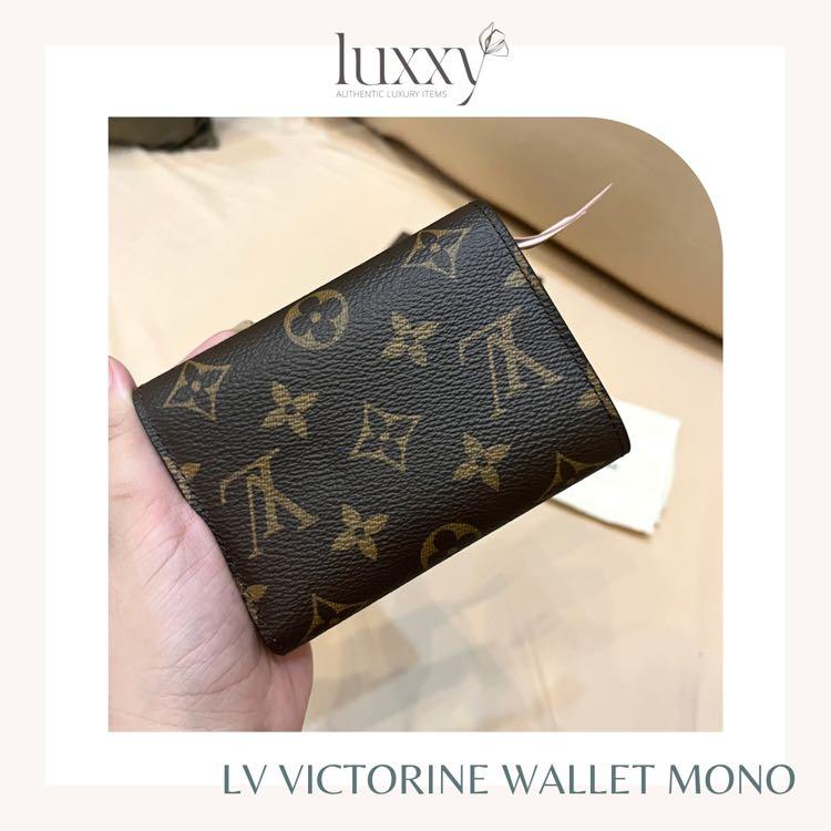 LV VICTORINE WALLET MONO (Category: Luxury Bags & Wallets) located in San Jose del Monte. Submitted by luxxyluxuryitems (Listing ID 1160058850, Image 2). Description: Basic essentials can be carried effortlessly in this feminine and functional Victorine wallet by Louis Vuitton. This compact wallet is crafted from the brand's iconic monogram canvas with a pink leather lining. It offers quick and secure access to credit cards, currency, and persona