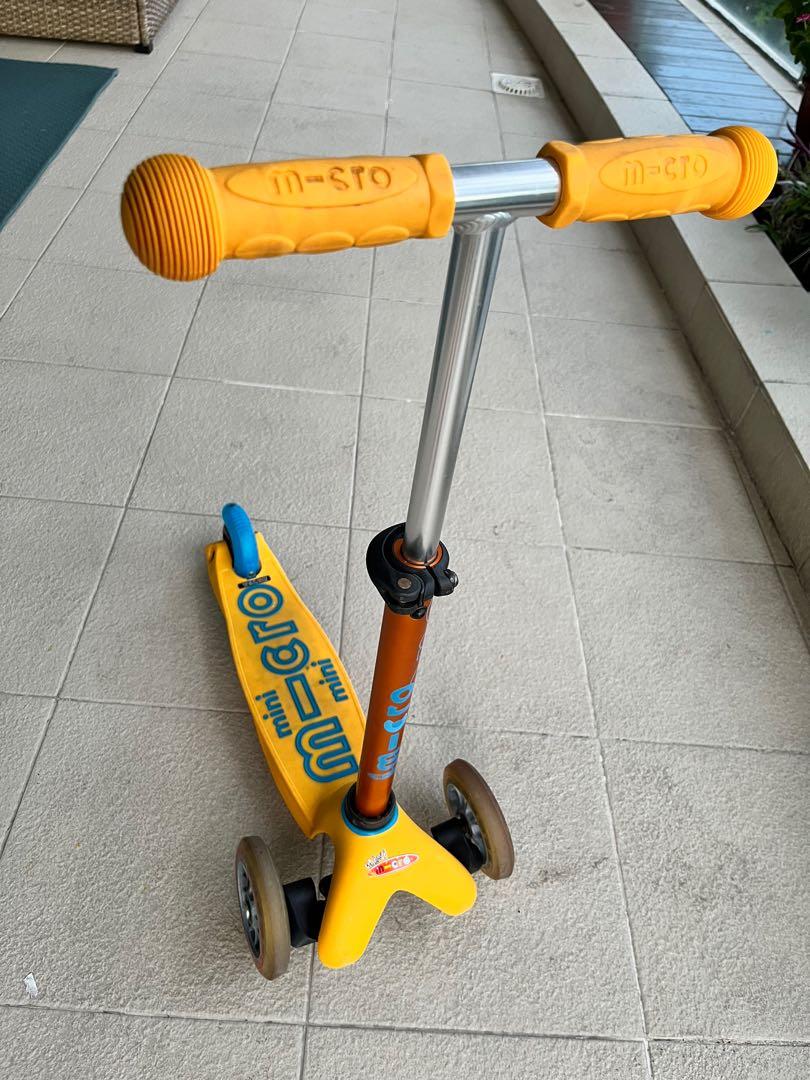 Yellow mini shop micro scooter