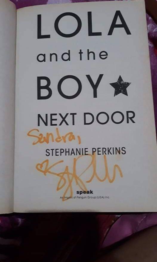 SIGNED Lola and the Boy Next Door (Category: Storybooks) located in Capas. Submitted by kris_11 (Listing ID 1159984070, Image 3). Description: The book is like new except for minimal tanning and foxing. You can message me for more photos.