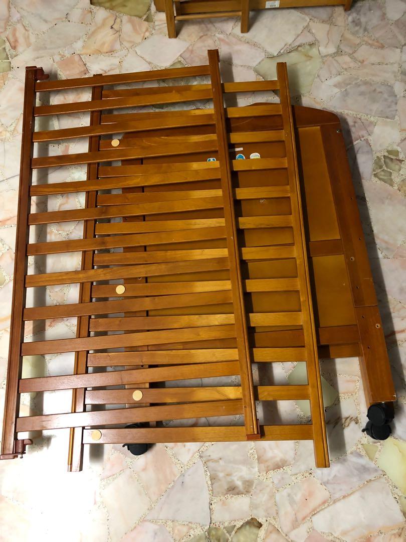 Solid baby cot x 2 (Category: Bed Frames & Mattresses) located in Singapore. Submitted by daphnete (Listing ID 1160103739, Image 1). Description: 2 set solid wood baby cot - 1 big 1 small Negotiable as moving house.