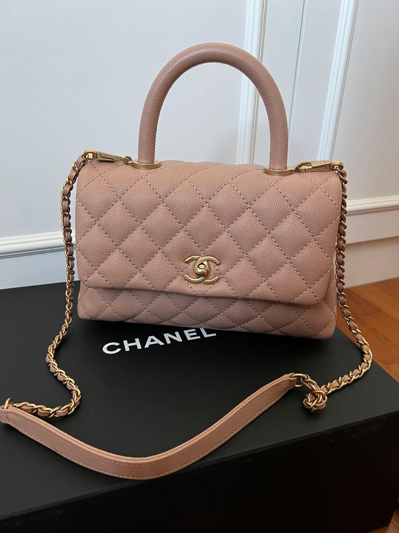 Chanel small coco handle 18s beige (Category: Bags & Wallets) located in Singapore. Submitted by semicharmed_ (Listing ID 1160166706, Image 1). Description: Beautiful 18s beige with aged gold hardware The perfect shade of beige with pink undertone Used lightly with minor signs of wear on right corner and base of handles due to attached chain. (Refer to photos) Still in great condition overall Not for fussies. Comes with box, dust bag and authenti