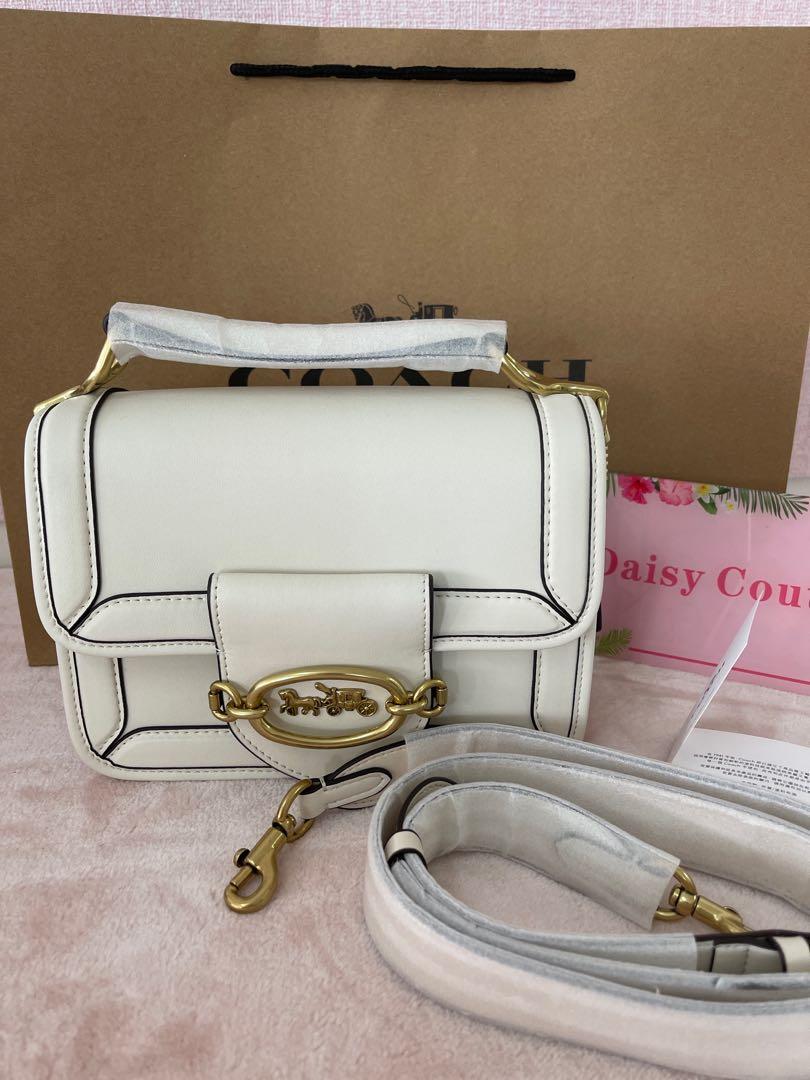 Coach white sling bag hotsell
