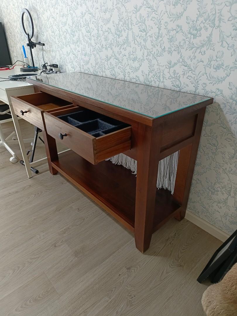 Study or Dressing Table (Category: Tables & Sets) located in Singapore. Submitted by sukiduck (Listing ID 1160187496, Image 2). Description: 120 cm (L) x 45 cm (B) x 81 cm (H). Solid wood console table from Picket & Rail. Made a glass top for this. Price already low and is non-negotiable coz it is quality wood. The item is at Bukit Batok. Please arrange your transport to pick up the item. Thank you..