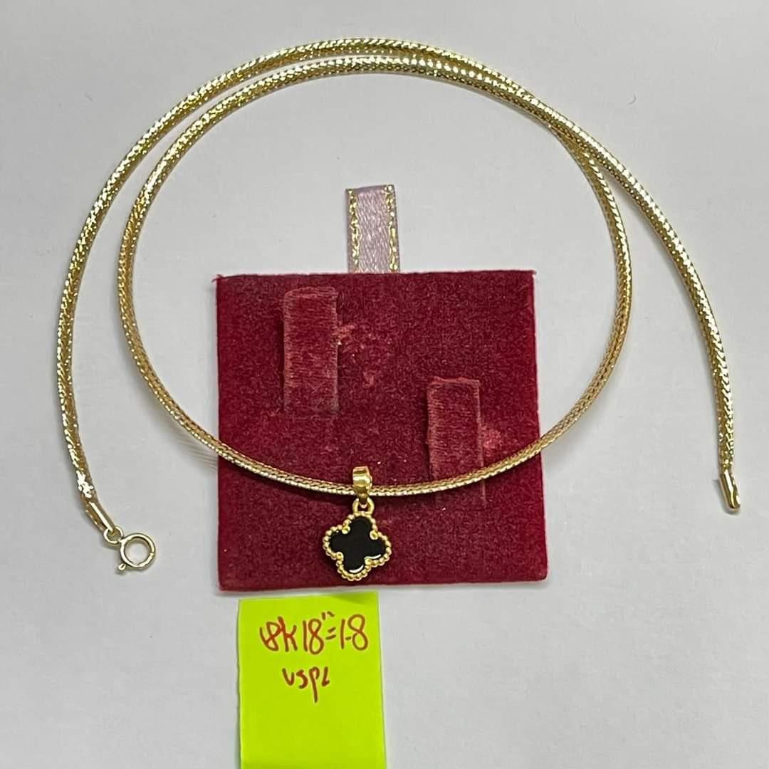 Omega store necklace pendant