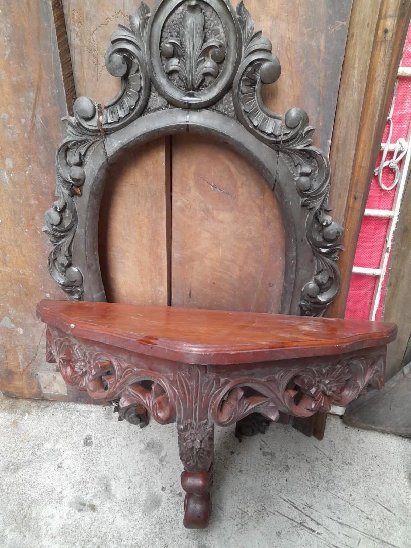 Narra mirror frame and hanging console (Category: Mirrors) located in Quezon City. Submitted by verybountiful (Listing ID 1160381872, Image 2). Description: Price for the pair. As is condition. Mirror frame needs refurbishing/repair but has great details. Console needs minor refurbishing. Dimensions: Mirror frame - 88 cm (highest) x 54 cm (at widest) x 3 cm (thickness) or 35" x 21" x 1.2" Hanging console- 72 cm (width) x 42 cm (height) x 30 cm (f