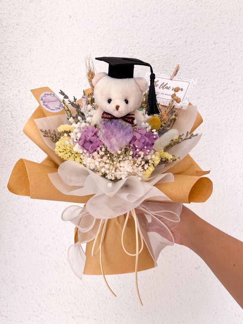 Graduation flowers store with bear
