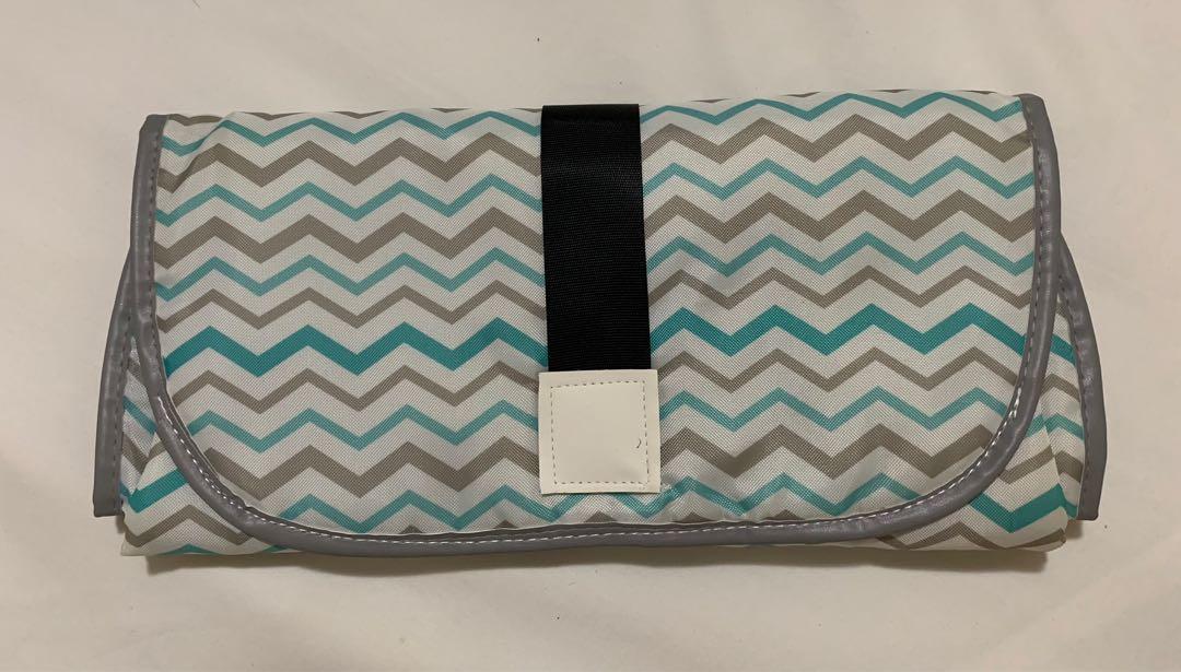 Travel Changing Mat for Babies (Category: Changing Mats & Accessories) located in Paranaque City. Submitted by nicmeroy (Listing ID 1160539323, Image 1). Description: Travel Changing Mat for Babies Conditiom: never been used.