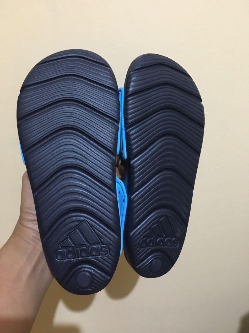 Adidas Sandals for Kids (Category: Babies & Kids Fashion) located in Mandaluyong City. Submitted by rafjaye (Listing ID 1160692218, Image 3). Description: Ayaw ni Baby suotin. Size: 18cm for 5-7yo .