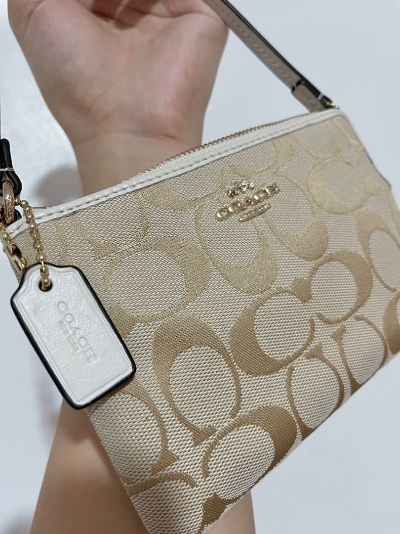 Used coach wristlet top