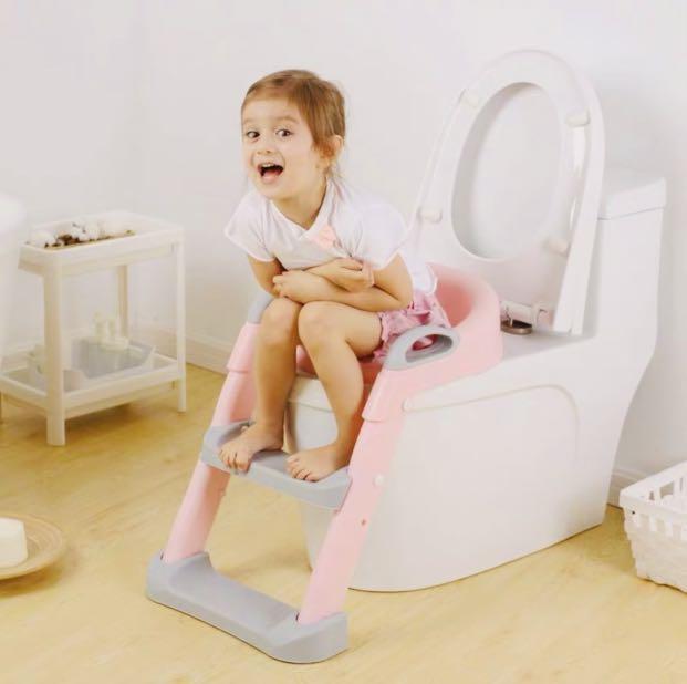 https://media.karousell.com/media/photos/products/2022/5/15/potty_training_toilet_seat_wit_1652630305_f67086d0_progressive.jpg