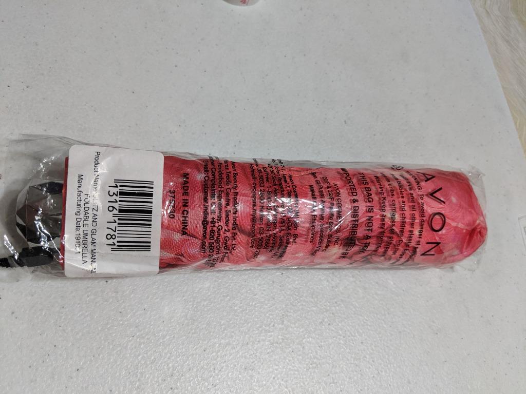 Avon Umbrella (Category: Umbrellas) located in Manila. Submitted by romantorres (Listing ID 1160930059, Image 2). Description: Avon glitz and glam manual foldable umbrella with sleeves..