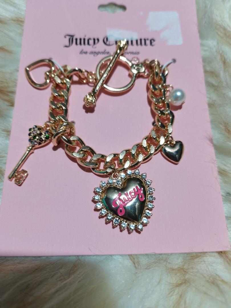 Juicy Couture Charm Bracelet (Category: Bracelets) located in Manila. Submitted by guiltlesspleasure (Listing ID 1160916216, Image 1). Description: Original JC Charm Gold Charm Bracelet Includes 5 super cutie charms Hearts, pearl and key.
