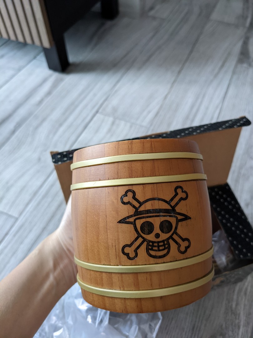 https://media.karousell.com/media/photos/products/2022/5/16/one_piece__wooden_mug_with_han_1652686404_dfc5f065.jpg