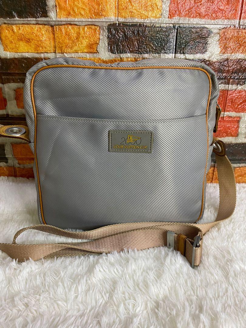 Rare Limited Edition Authentic Louis Vuitton Cup 2009 (Category: Luxury Bags & Wallets) located in Cagayan de Oro. Submitted by riggstuffs (Listing ID 1161047232, Image 1). Description: Guaranteed Authentic Rare Limited edition LV cup 2000 Made of Canvas material with leather trimming The exterior is in very good condition, with no rubs and no open piping at all corners The Interior has a zip pocket and has some minor stains Hardware are good, a 