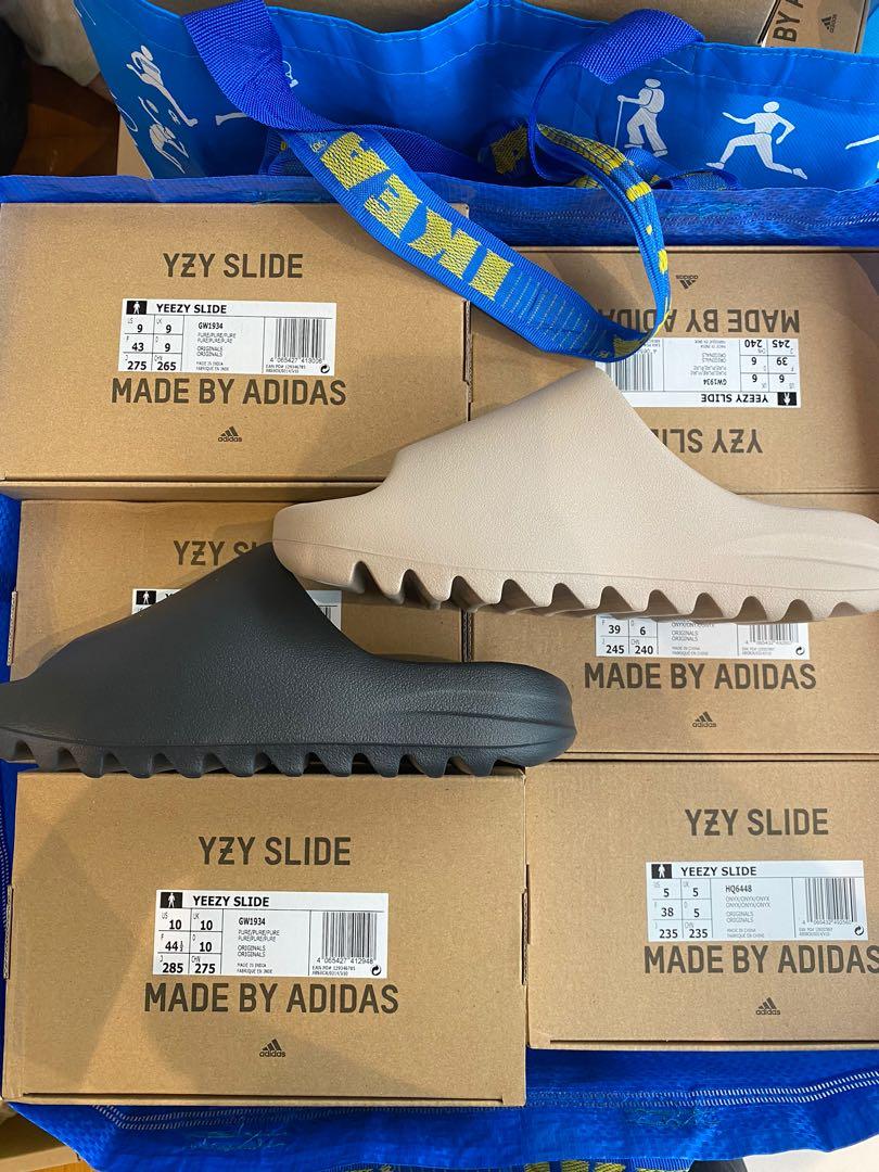Yeezy slides pure onyx, Men's Fashion, Footwear, Sneakers on Carousell