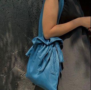 Blue silk bag