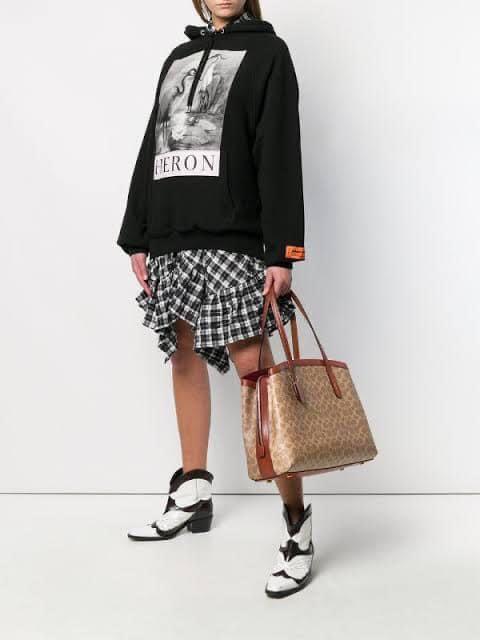 Coach Charlie Carryall in Signature Canvas
