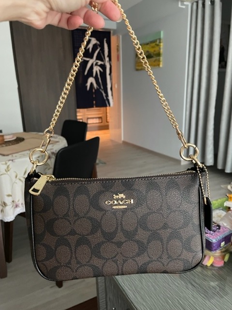 Coach wristlet with gold chain sales