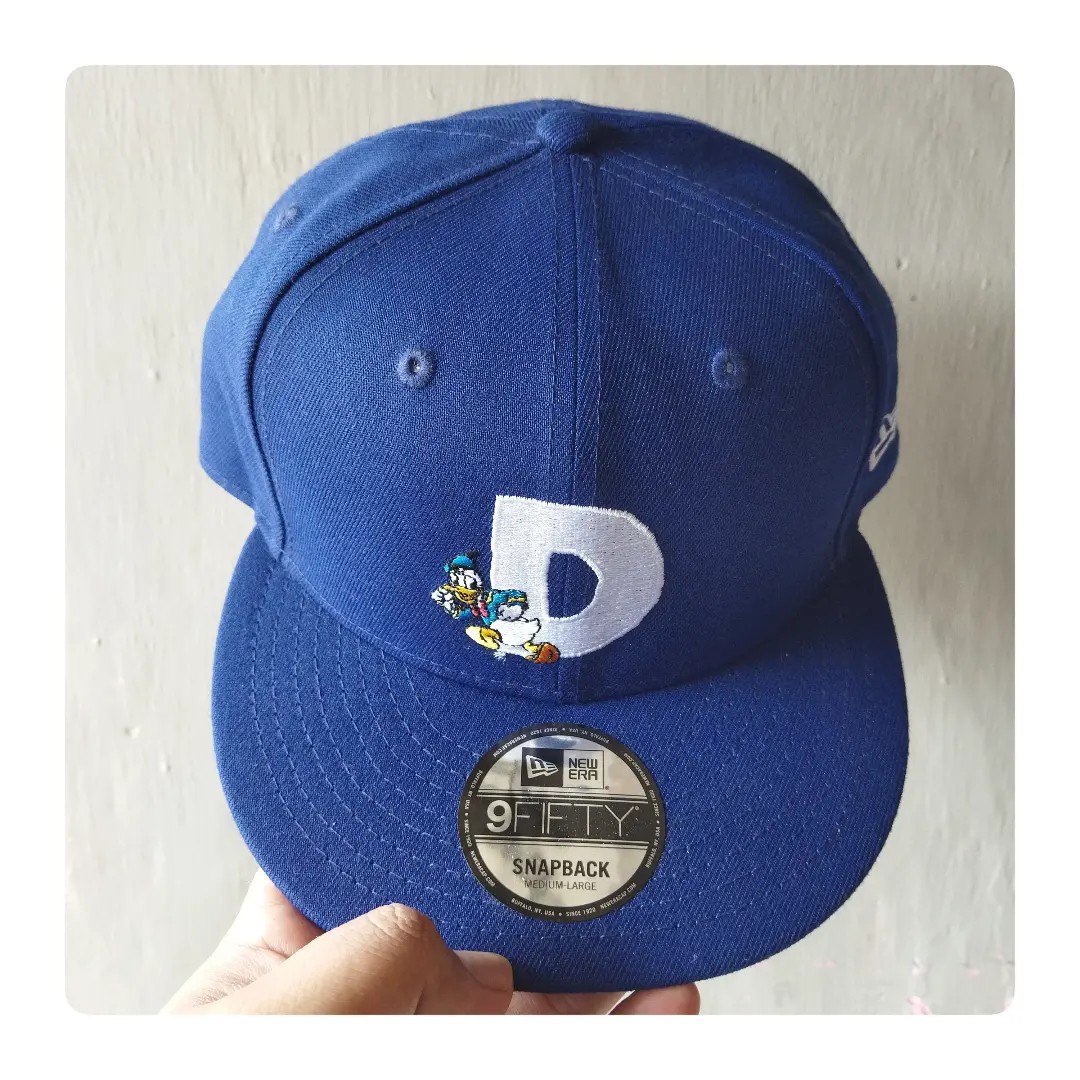 New Era Cap Disney Donald Duck, Fesyen Pria, Aksesoris, Topi di Carousell
