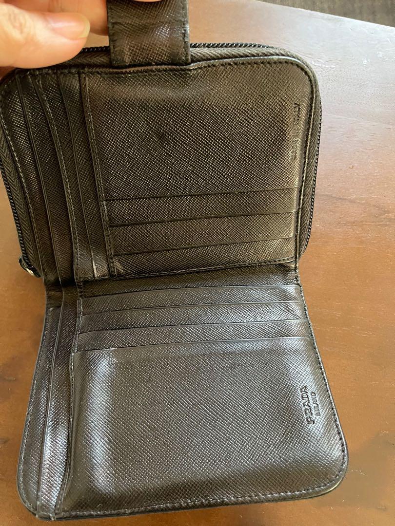 Prada wallet (Category: Luxury Bags & Wallets) located in Quezon City. Submitted by ejbumgen5678 (Listing ID 1161248870, Image 3). Description: Original legit prada preloved wallet Nylon Leather inside With coin slots With card slots and paper bills PRELOVED COSTS 7k up Selling very low Signs of use only on nylon on outside of wallet Leather inside is still super nice.