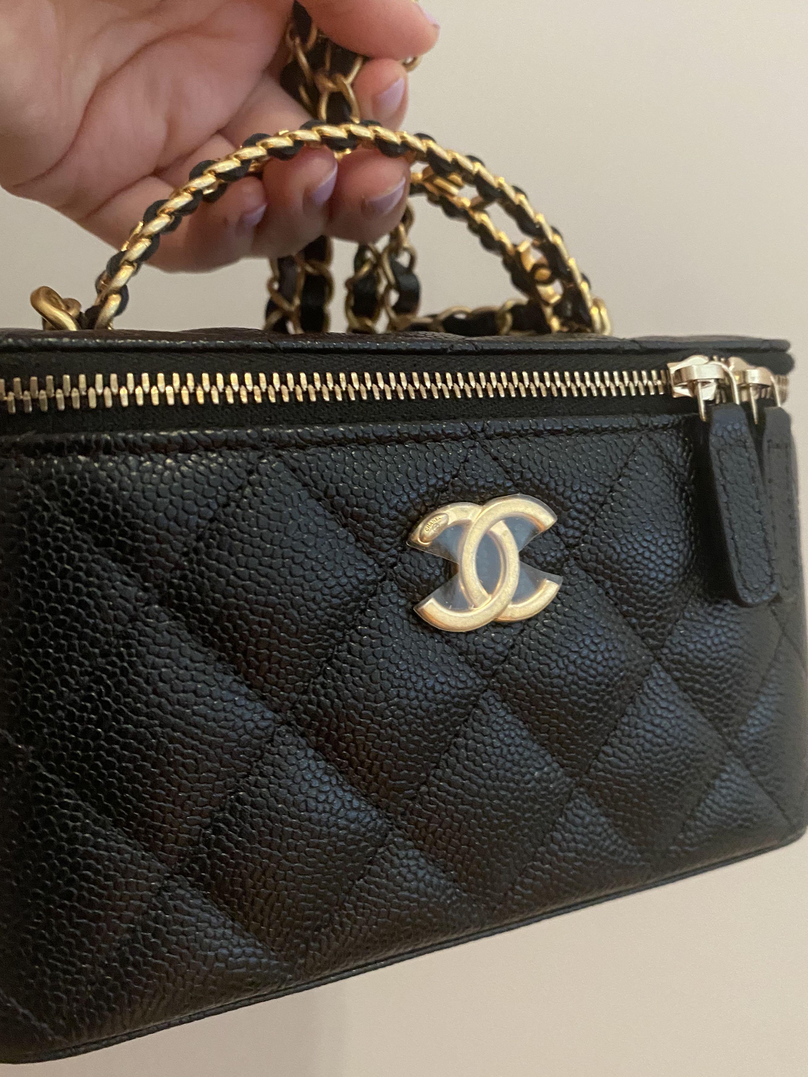 Authentic new 22S Chanel top handle vanity in black caviar, Women's  Fashion, Bags & Wallets, Cross-body Bags on Carousell