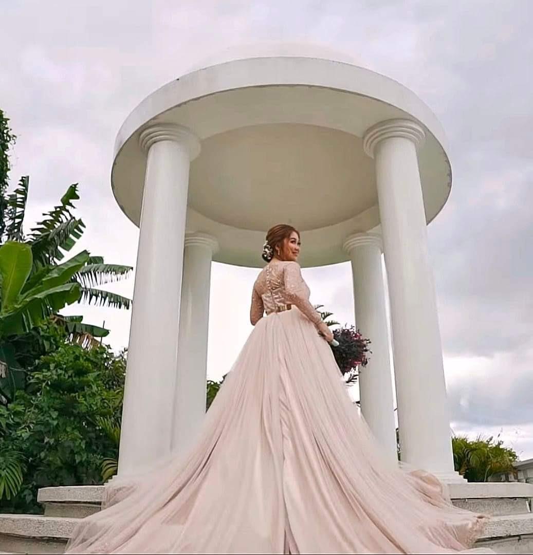 Gown with long trail 2025