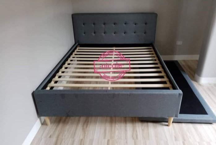 Queen size bed frame with pull out (Category: Bed Frames & Mattresses) located in Pasay City. Submitted by cherry_nicole (Listing ID 1161509056, Image 1). Description: 14,500 Queen size bed frame 60x75 with single pull out 36x75 fabric gray padded headboard.