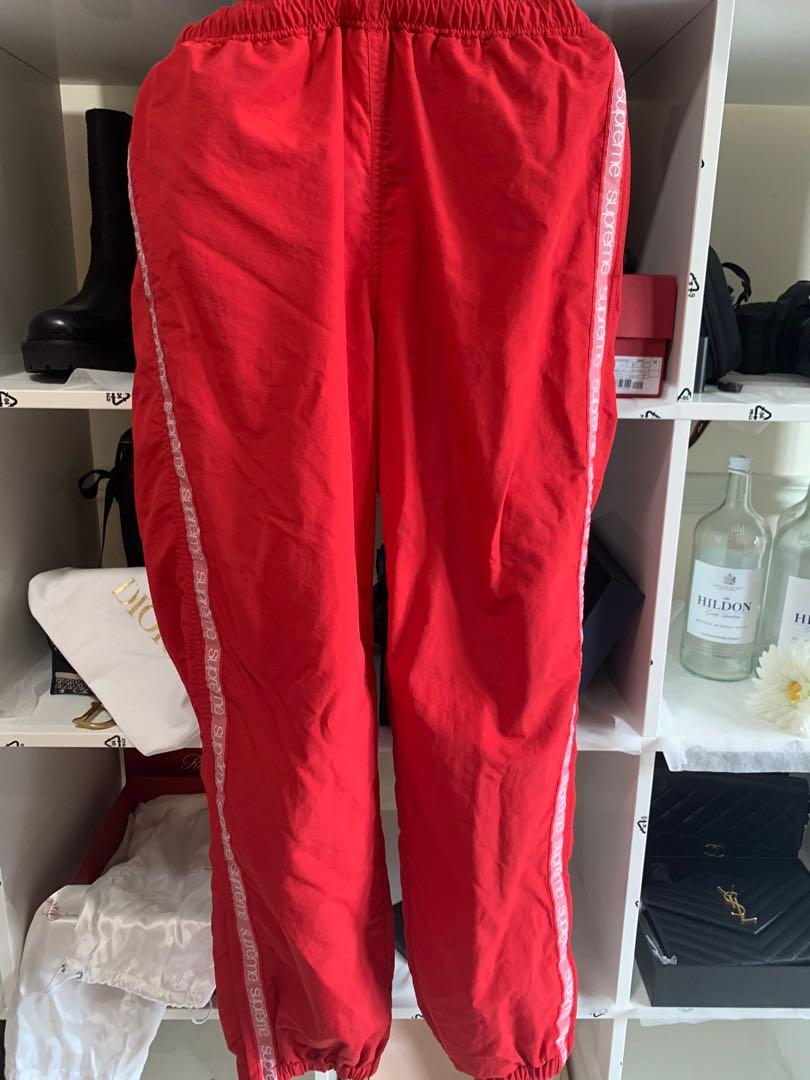 Supreme red track pants store