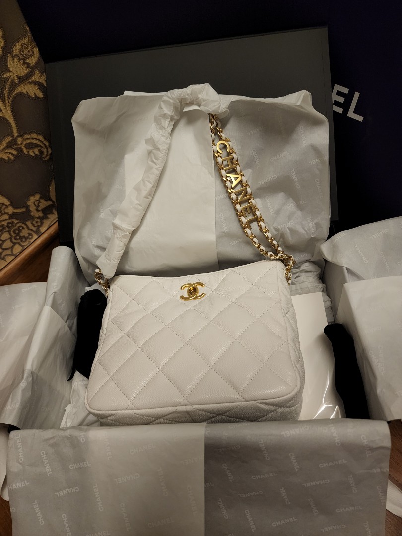Chanel small hobo bag 22s white caviar, Women's Fashion, Bags