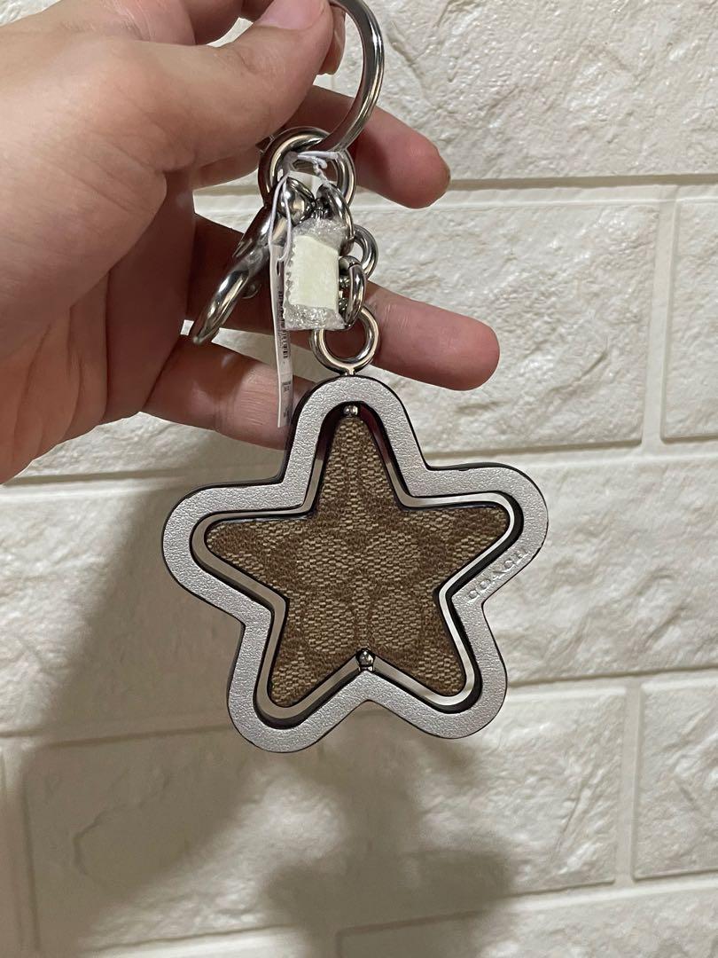 Coach star bag charm deals