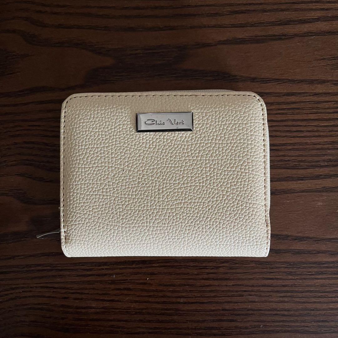 cream bifold wallet