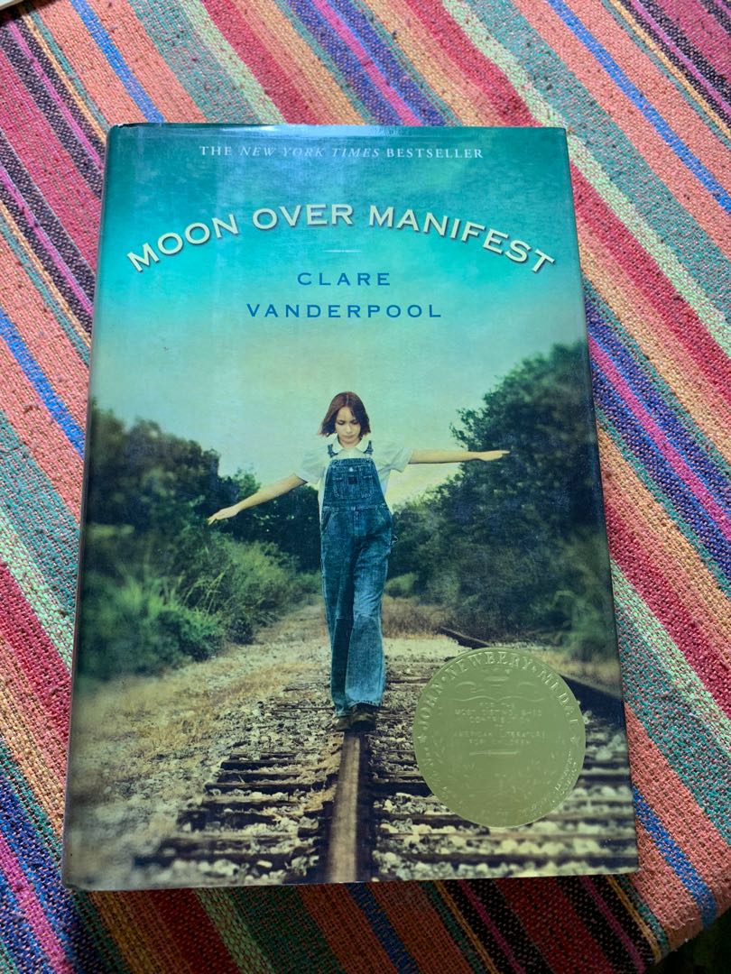 Moon Over Manifest By Clare Vanderpool Hobbies Toys Books Magazines Fiction Non Fiction On Carousell
