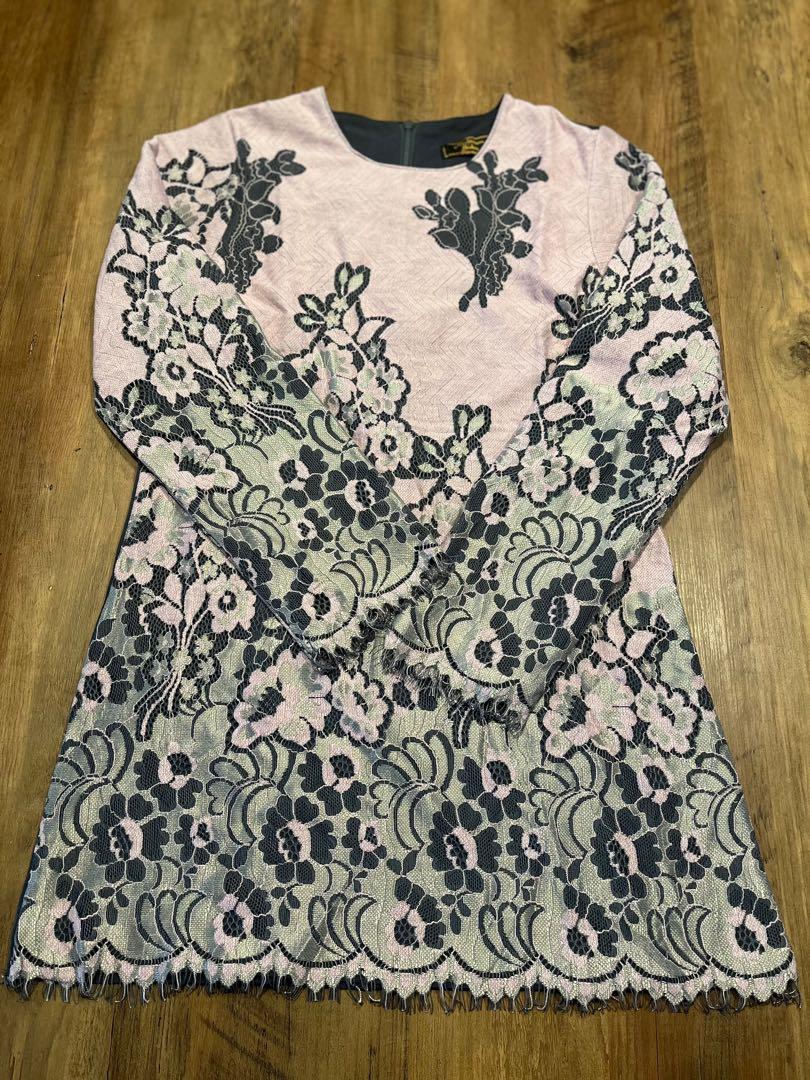 Preloved Purple Lace Mermaid Kurung (Category: Babies & Kids Fashion) located in Singapore. Submitted by littlemakciks (Listing ID 1158409809, Image 1). Description: Preloved Purple Lace Mermaid Kurung. Shoulder length 32cm, Pit-to-pit 41cm, Too dress length 66cm. Skirt Mermaid style, waist 27cm stretch up to 40cm, length up to 93cm..