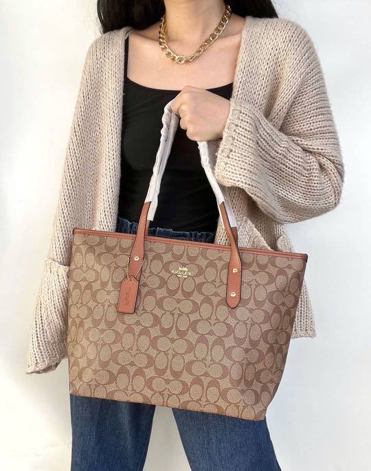 Coach signature clearance city zip tote