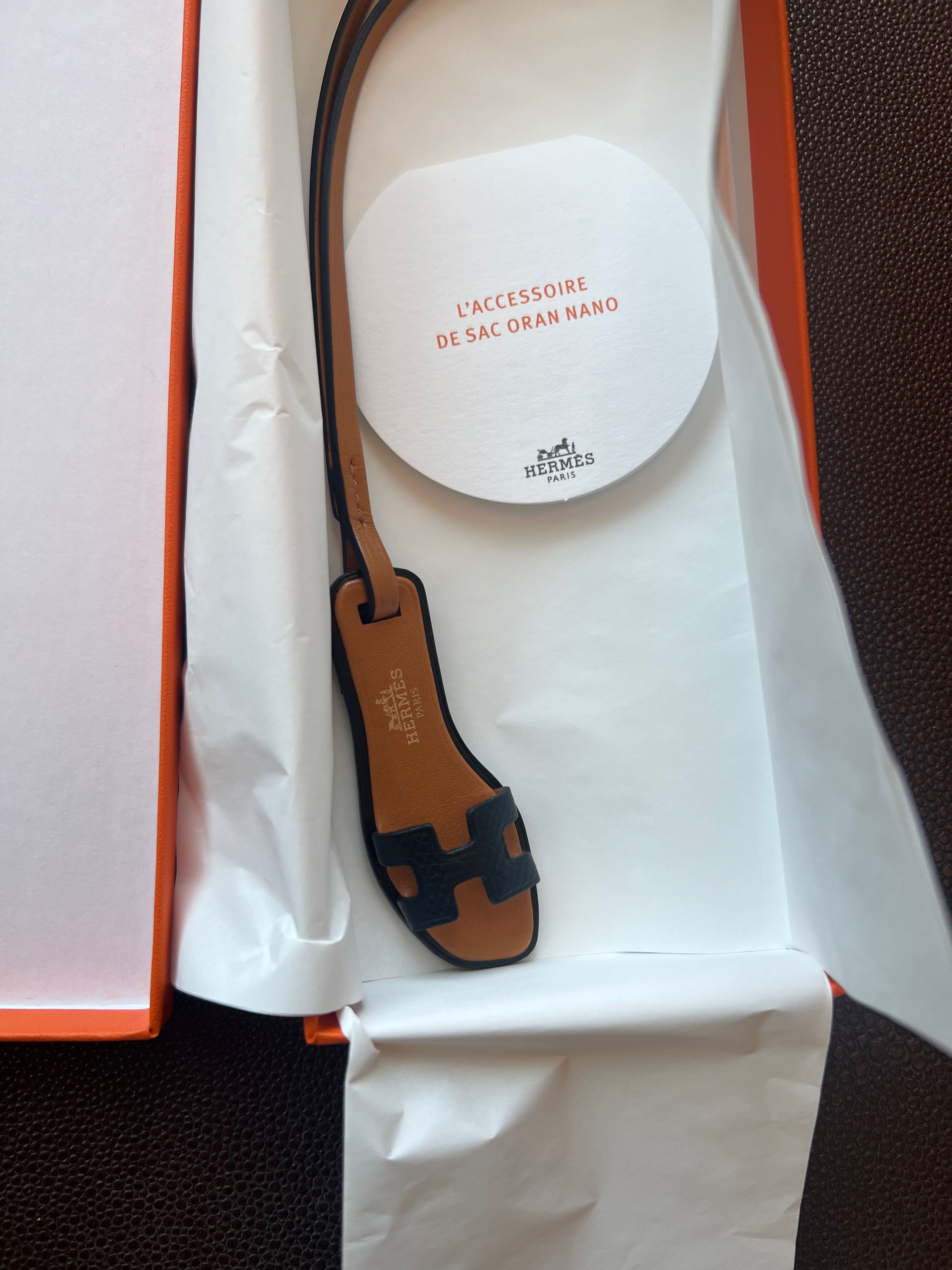 Hermes oran sandal best sale charm