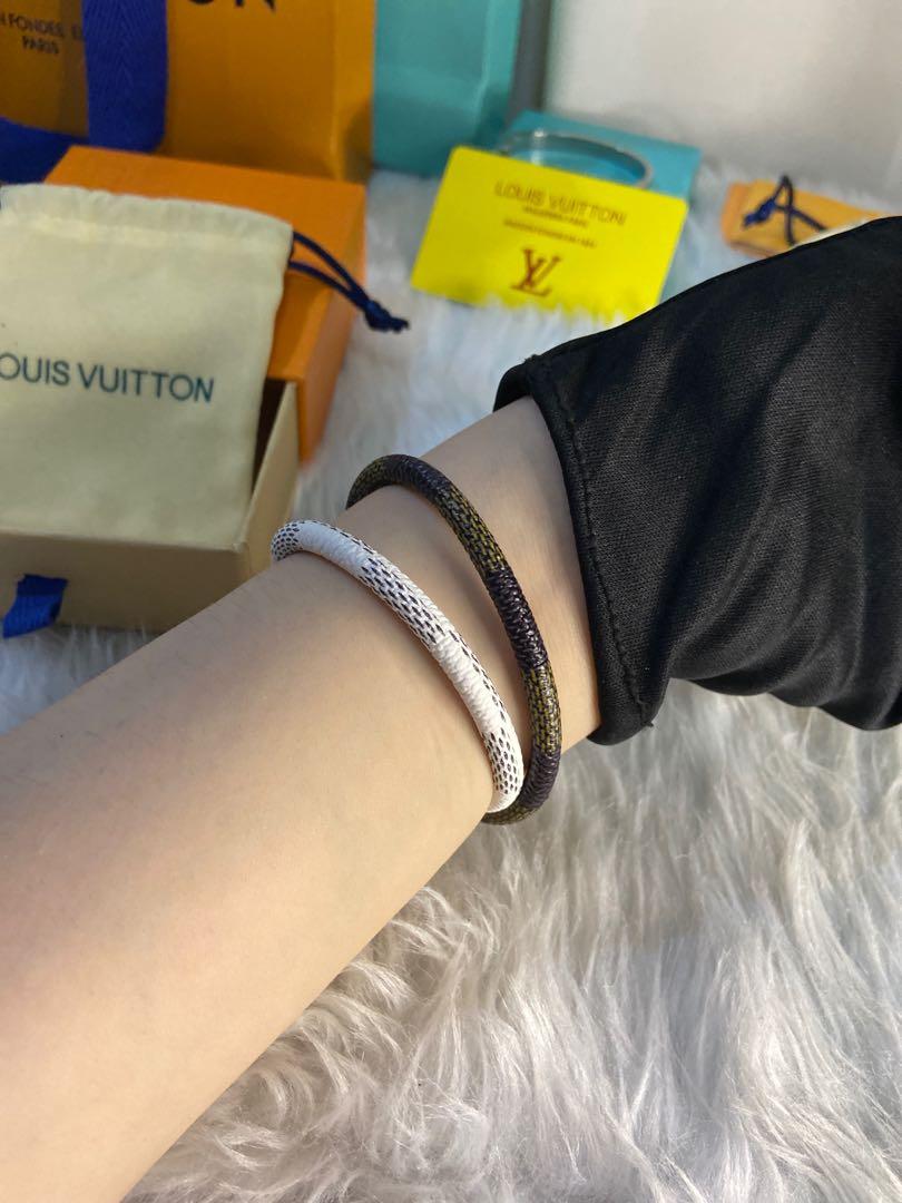 Louis Vuitton white damier magnetic leather bracelet, Women's Fashion,  Jewelry & Organizers, Bracelets on Carousell