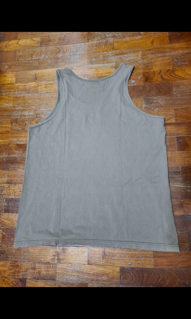 SAF Admin PT Singlet (Category: Activewear) located in Singapore. Submitted by thriftshopparadise (Listing ID 1161664310, Image 2). Description: Old design Size m Condition Good Good for collectors Tag Saf rsaf rsn scdf ndu BMTC scout uniform group NPCC NCC safsa commando guards military army armour BB Boys' Brigade.