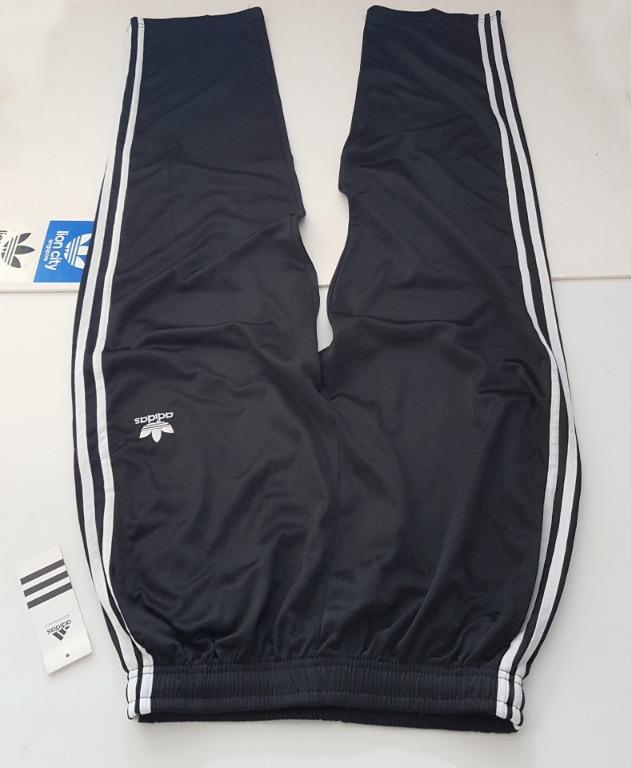 adidas the brand with the 3 stripes pants