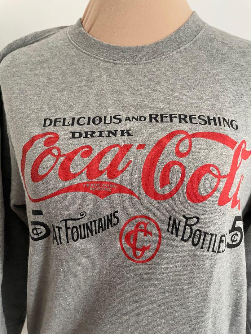 Uniqlo Limited Edition Coca Cola Sweater, Women's Fashion, Coats, Jackets and Outerwear on Carousell