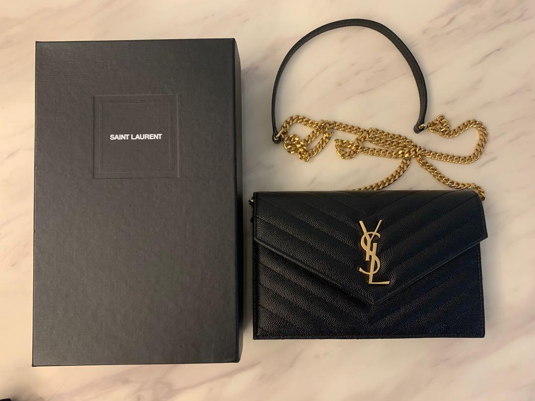 Ysl envelope monogram wristlet, Luxury, Bags & Wallets on Carousell