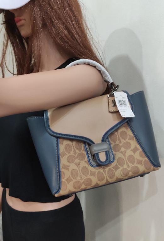 699 Coach Courier Carryall 23 In Colorblock Signature Canvas in Tan Dark Denim Multi Women s Fashion Bags Wallets Shoulder Bags on Carousell