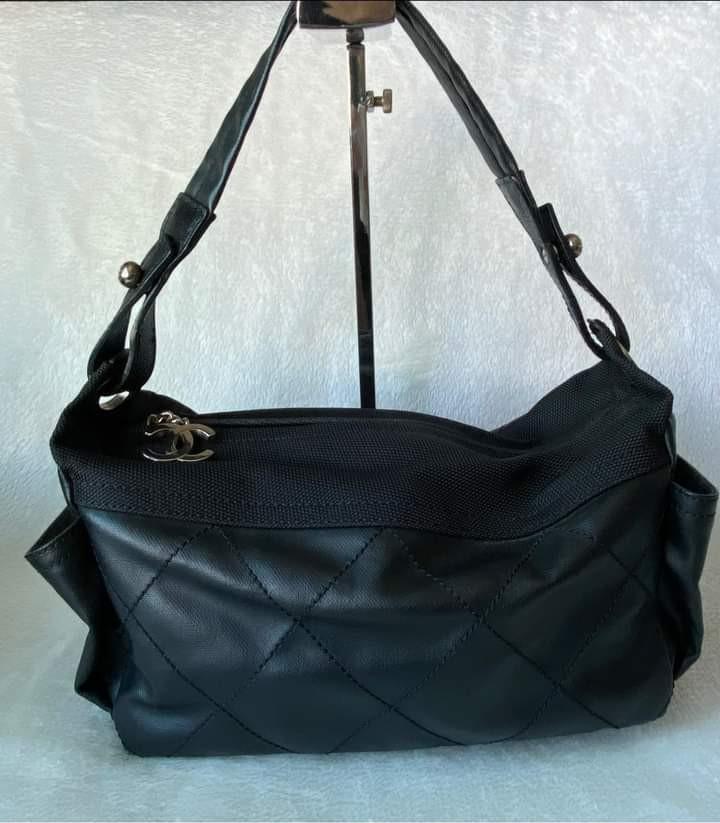 Chanel Biarritz Shoulder Bag (Category: Luxury Bags & Wallets) located in Manila. Submitted by bagislifeshop (Listing ID 1162124265, Image 2). Description: ▪️Chanel Black Biarritz shoulder bag▪️ ☑️In transit to Manila ✅Series 11 ✅Condition: 8.5/10 ✅Dimensions: L25.5 H16 W13.5cm ✅Color: Black in SHW ✅Material: Calf leather ✅Inclusions: Dust bag, hologram sticker and entrupy certificate.