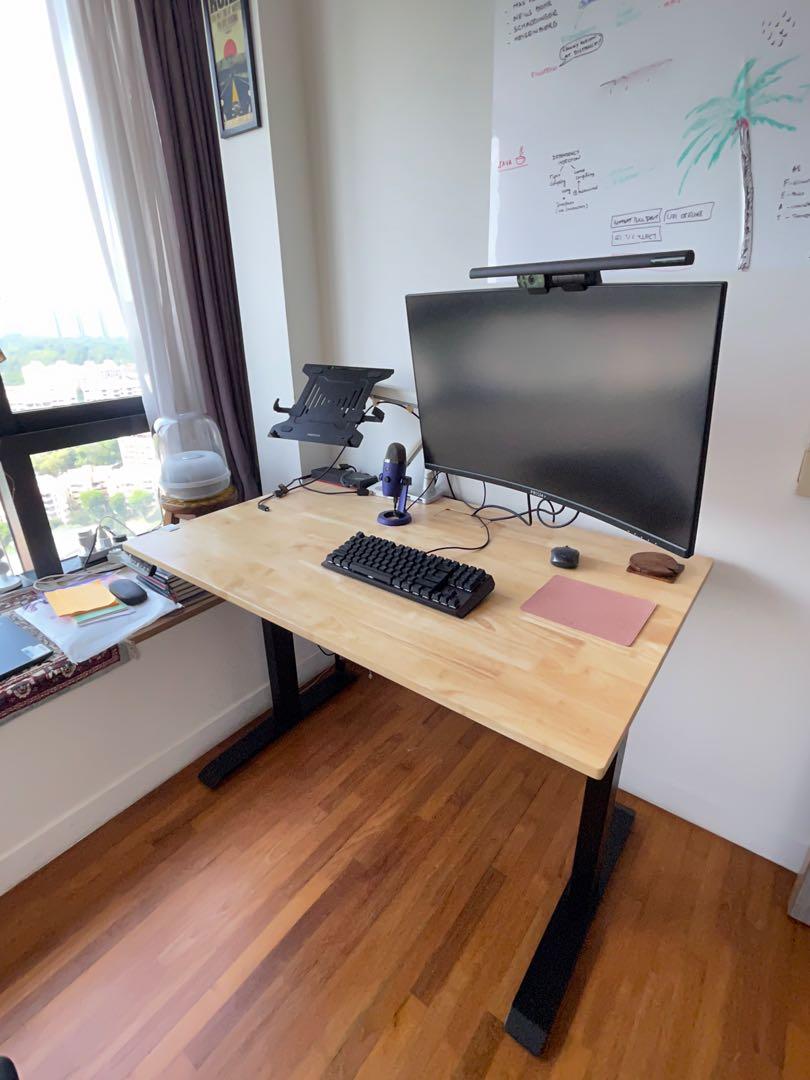 Computer Table (Category: Tables & Sets) located in Singapore. Submitted by dinsinapple (Listing ID 1162021708, Image 3). Description: Omnidesk Wildwood 2020. Standing desk in brand new condition. Have to dispose as I am moving out of singapore. .