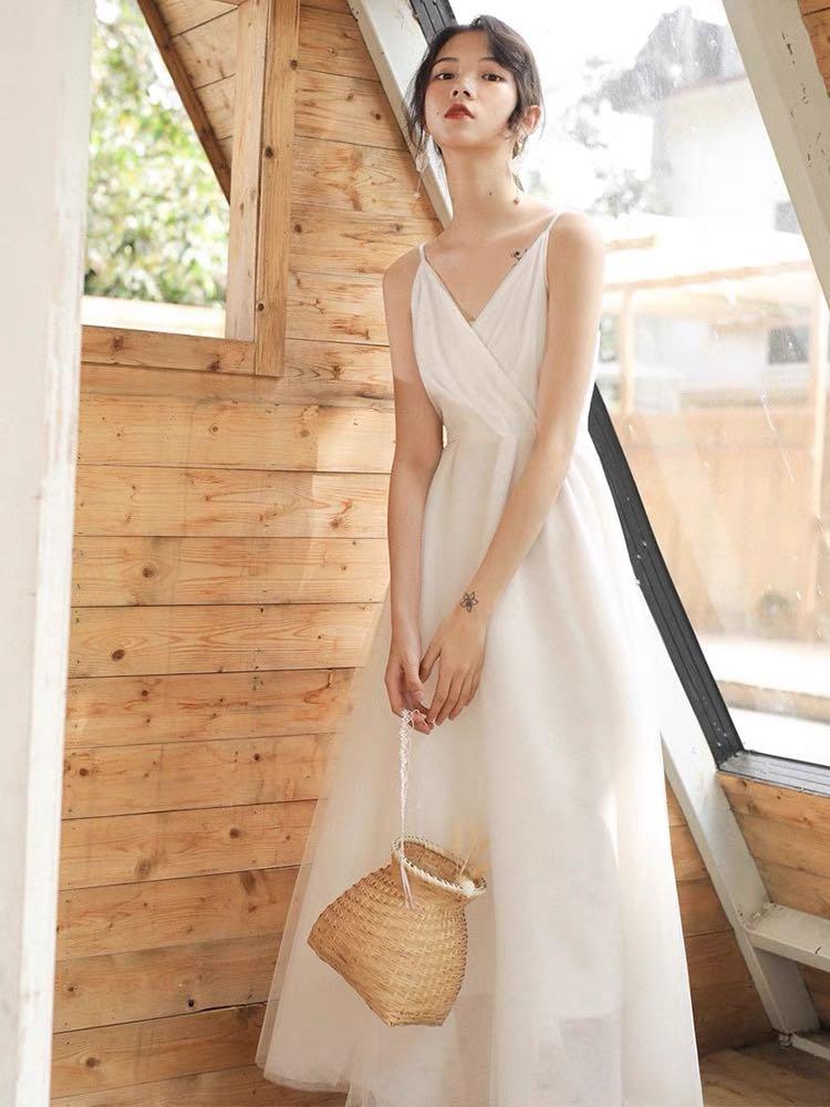 Simple flowy store white dress