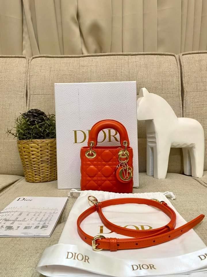 Lady Dior Micro Orange GHW 2020 Adjustable Strap (Category: Luxury Bags & Wallets) located in Manila. Submitted by bagislifeshop (Listing ID 1162121551, Image 1). Description: Our First ever Micro Lady Dior 🧡🧡🧡 Soooo Adorable 🧡🧡🧡 On Hand in PH 🇵🇭 100% Authentic Lady Dior Micro Orange GHW 2020 Adjustable Strap Condition: 9/10 Comes with Box Dustbag Entrupy Cert and Booklet.